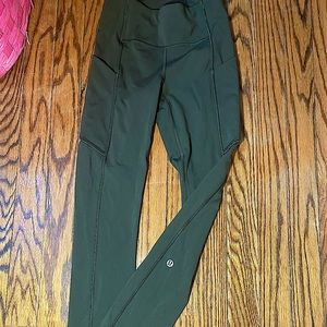 This is a Lululemon olive green pair of aligned leggings